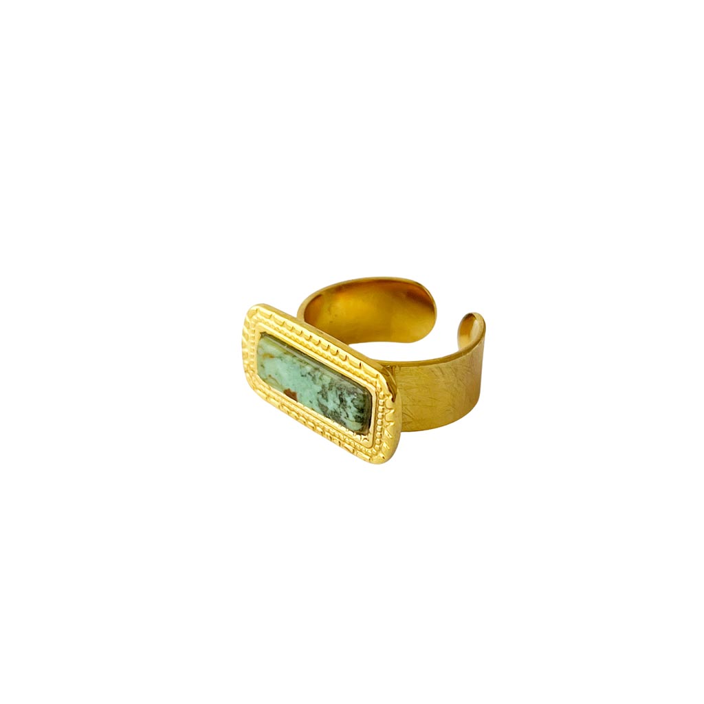 Anillo abierto de acero cepillado dorado con piedra de turquesa rectangular